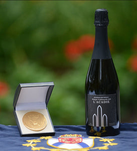 Photo of our wine by a gold medal at the Lieutenant-Governor’s Award for Excellence in Nova Scotia Wines Ceremony